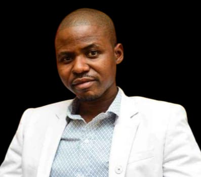 Dr. Idowu Olugbenga Adewumi serving as Charter President